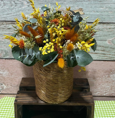 Centro de flores preservadas tonos amarillos